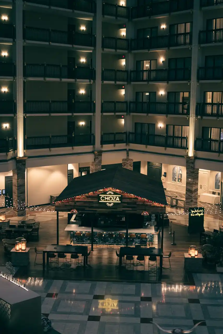 Dramatic hotel interior with bar and seating