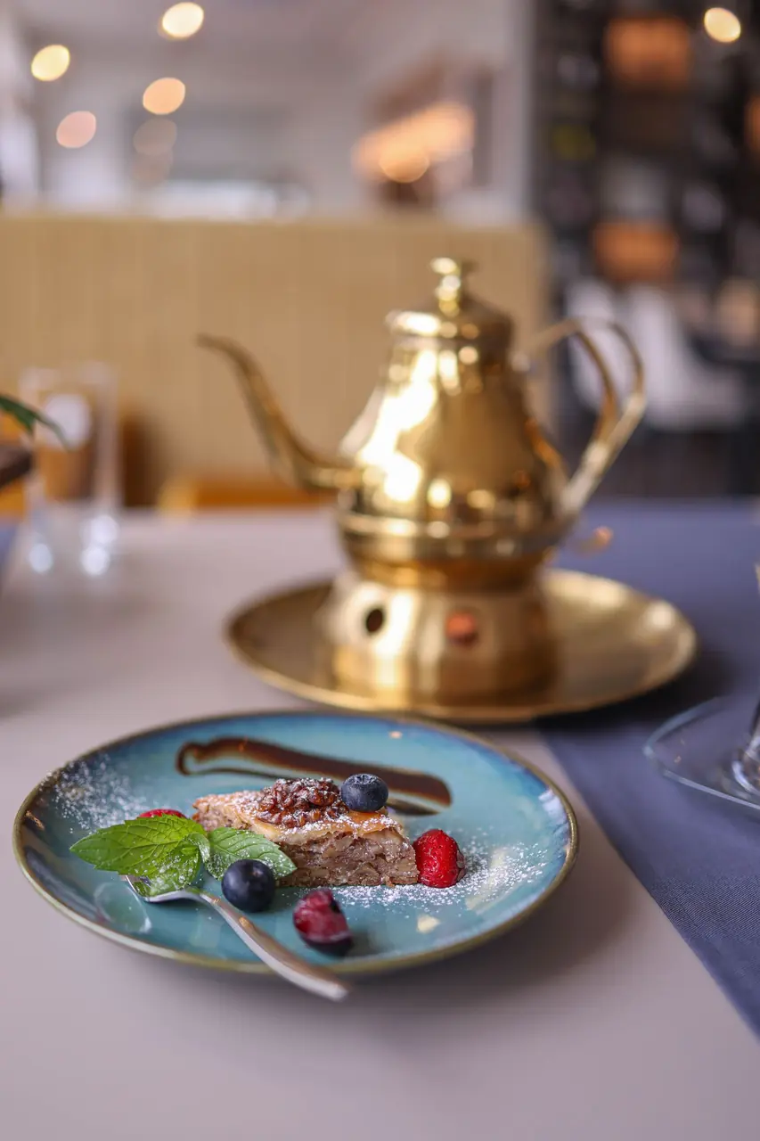Luxurious tea service with berry cake
