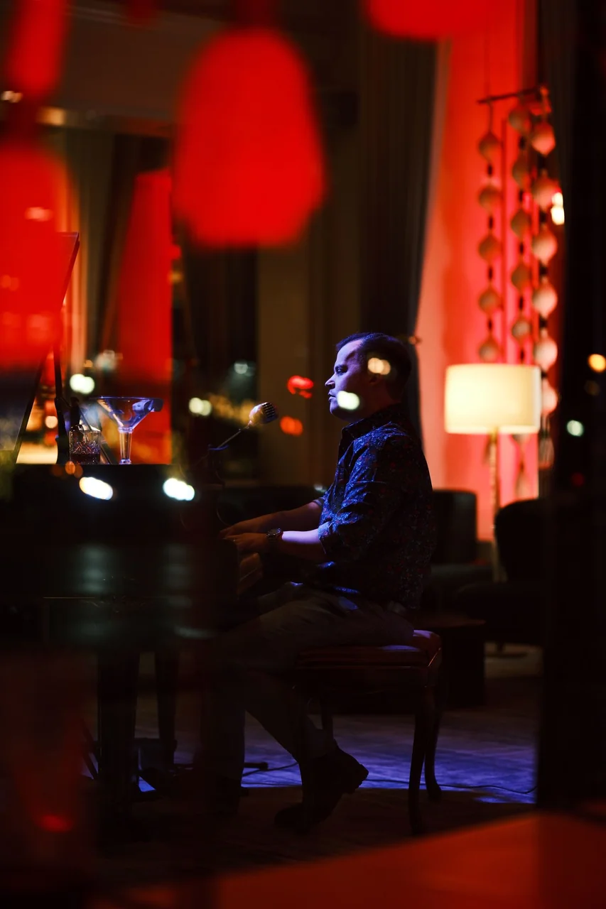 Pianist performing in a sophisticated lounge