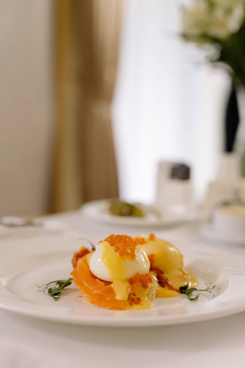 Gourmet plated dish with poached egg and salmon
