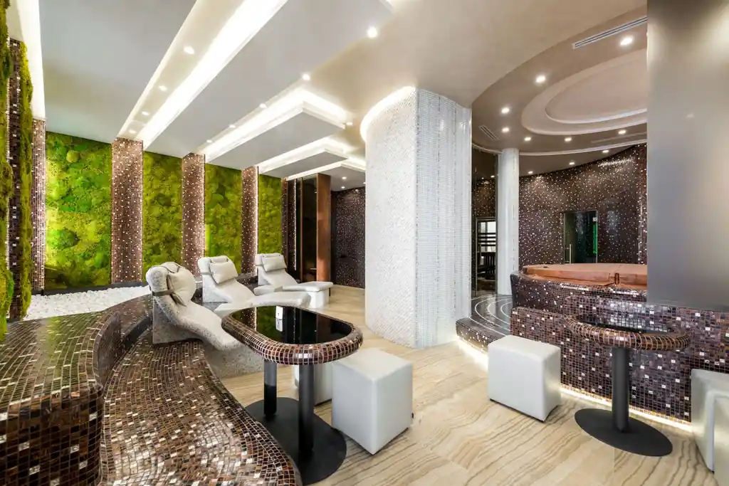Heated chaise lounges in a luxury spa setting